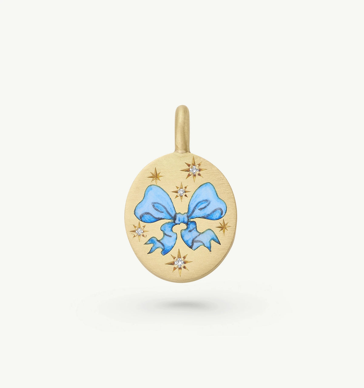 Gold pendant featuring a blue bow in enamel and accented with white diamonds.