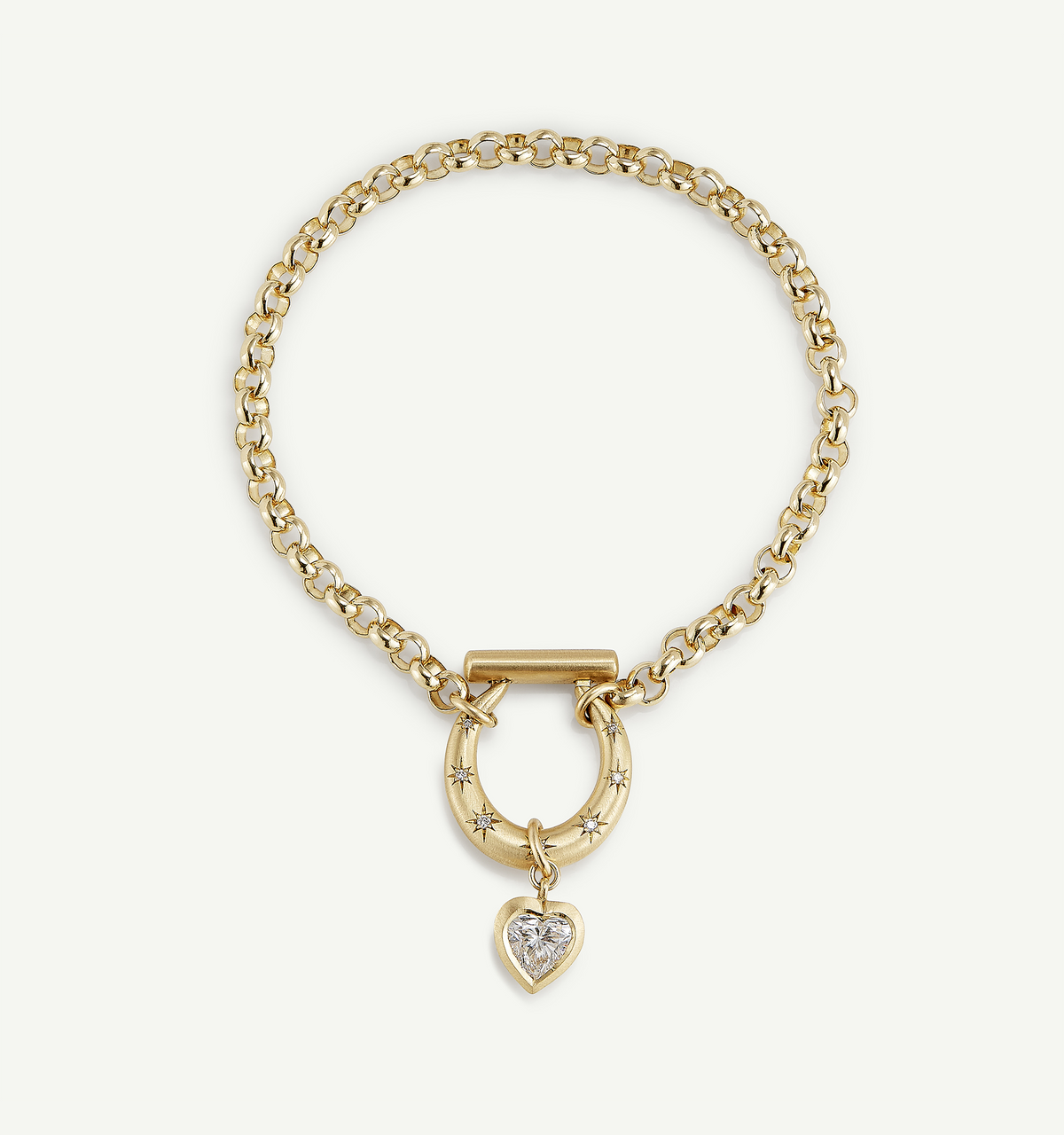 Gold chain necklace featuring a heart-shaped pendant set with a clear diamond.