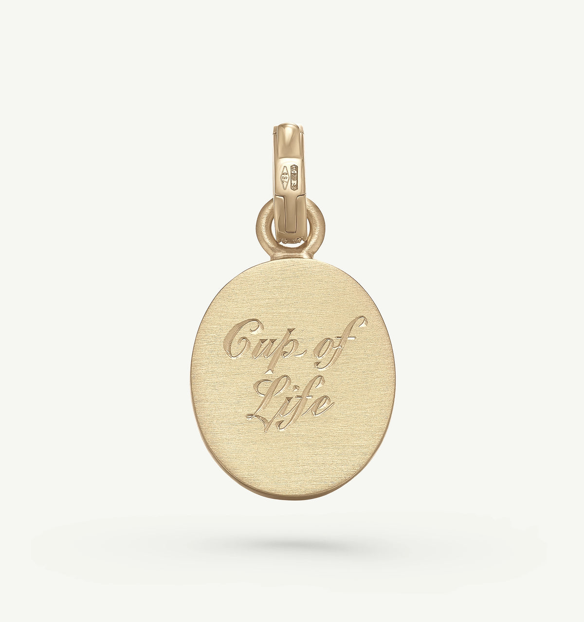 Gold pendant engraved with the words "Cup of Life" on a plain background.