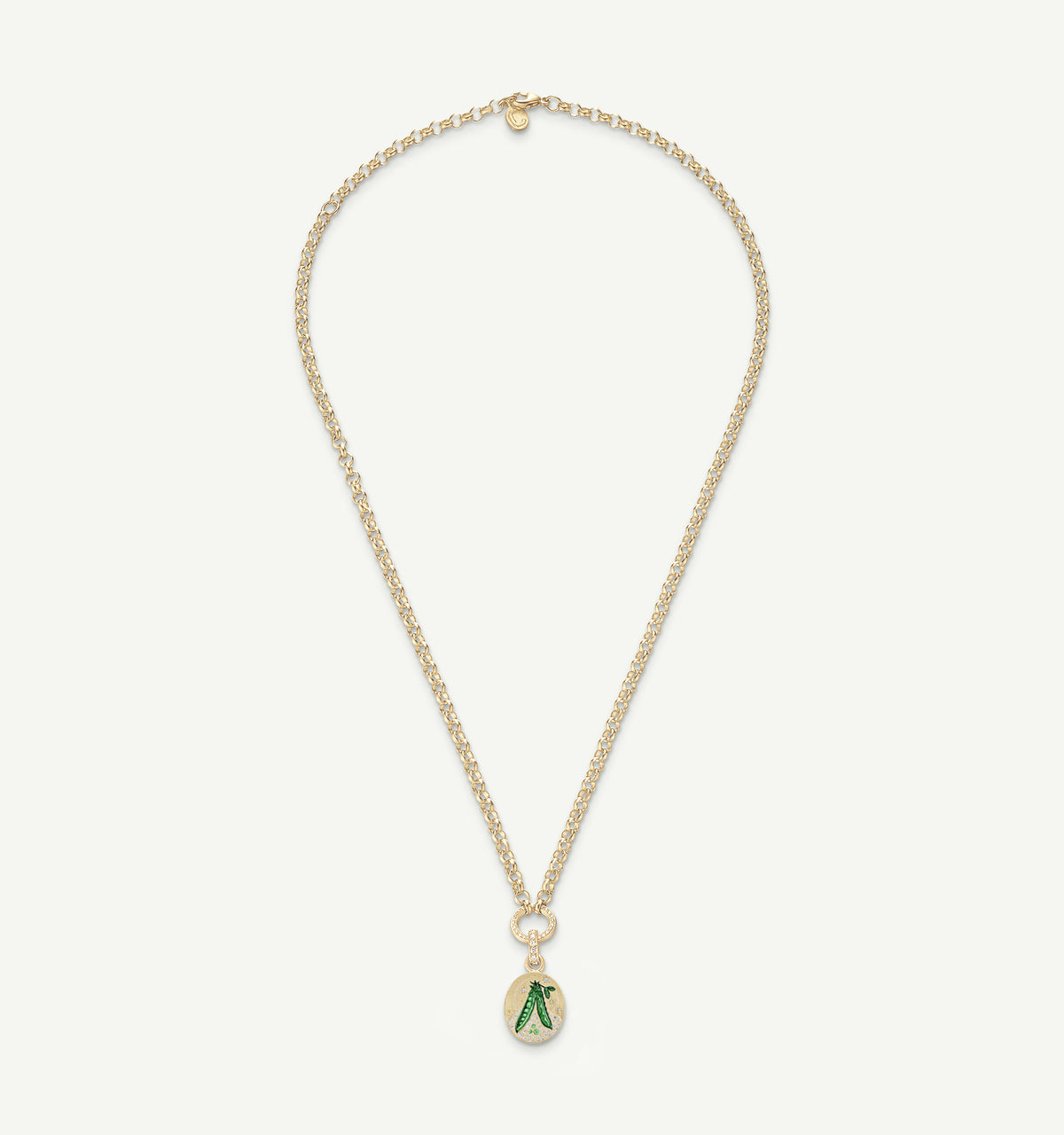Gold necklace featuring an enamel pendant with a green motif on a delicate chain.