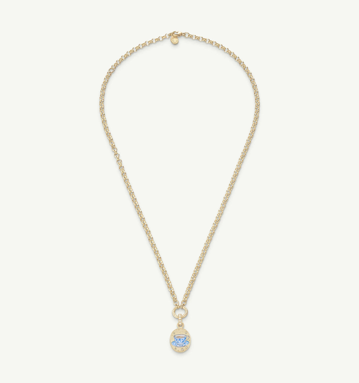 Gold necklace featuring a blue topaz pendant on a textured chain.