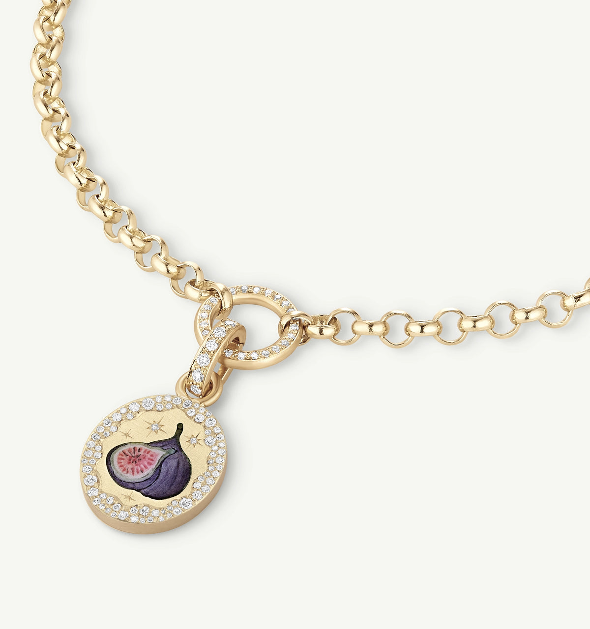 Gold necklace featuring a fig pendant with enamel detail and diamond accents.