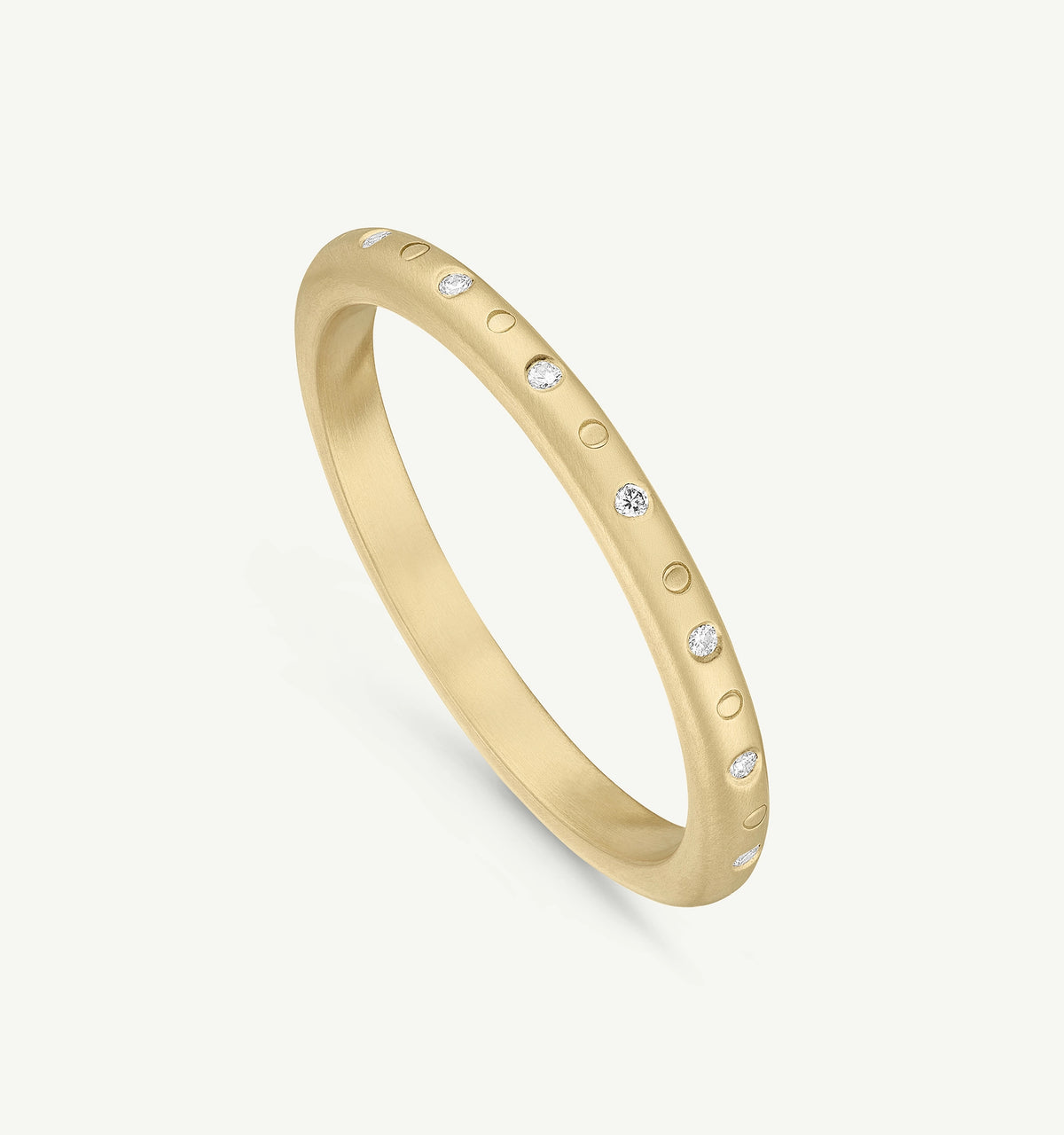 Gold ring with a matte finish, featuring round diamonds set in varying sizes around the band.