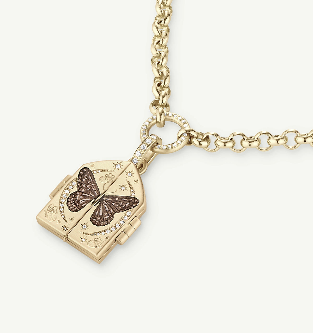 Gold locket necklace featuring an engraved butterfly design and additional diamond accents.
