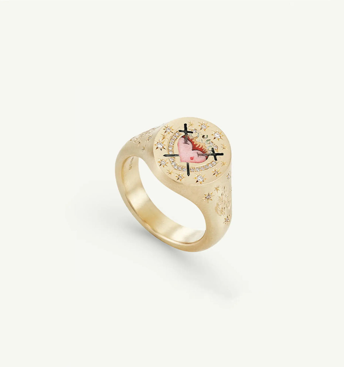 Gold ring featuring a red heart design in enamel with floral motifs on the band.