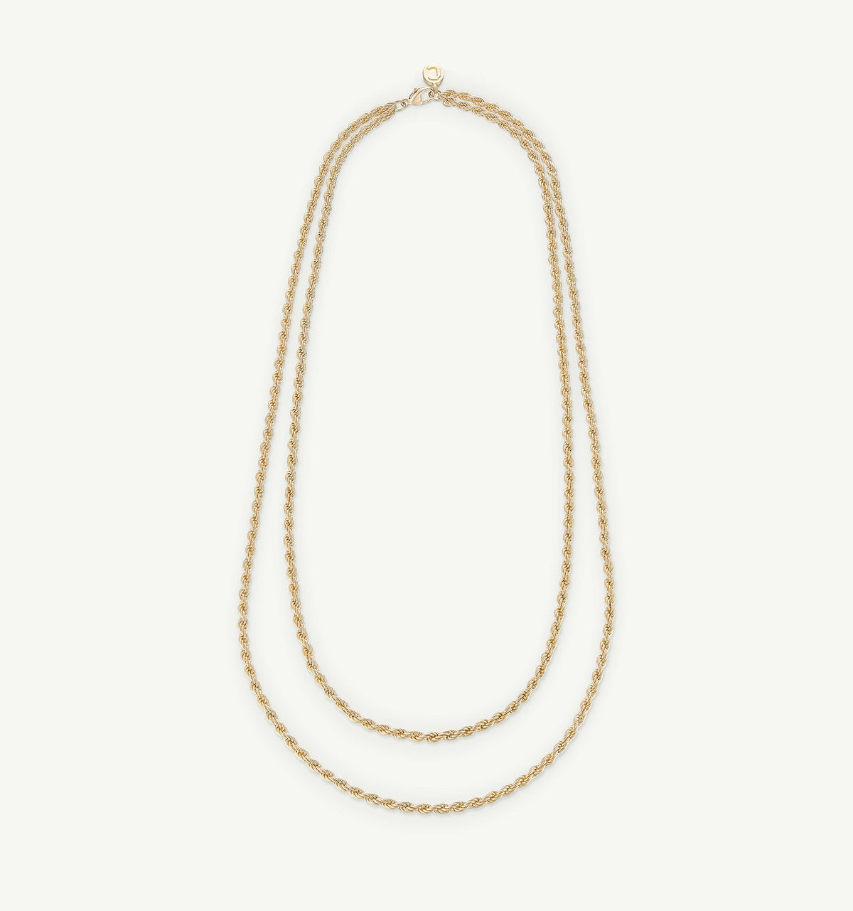 Gold double-strand necklace featuring intricately twisted links.