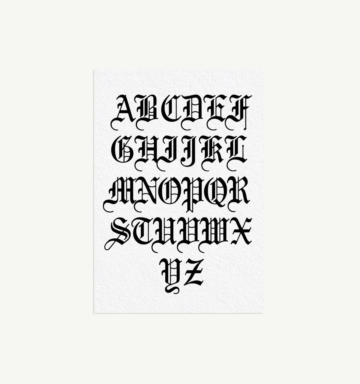 Alphabet in ornate black script on a white background, featuring decorative serif letters A to Z.