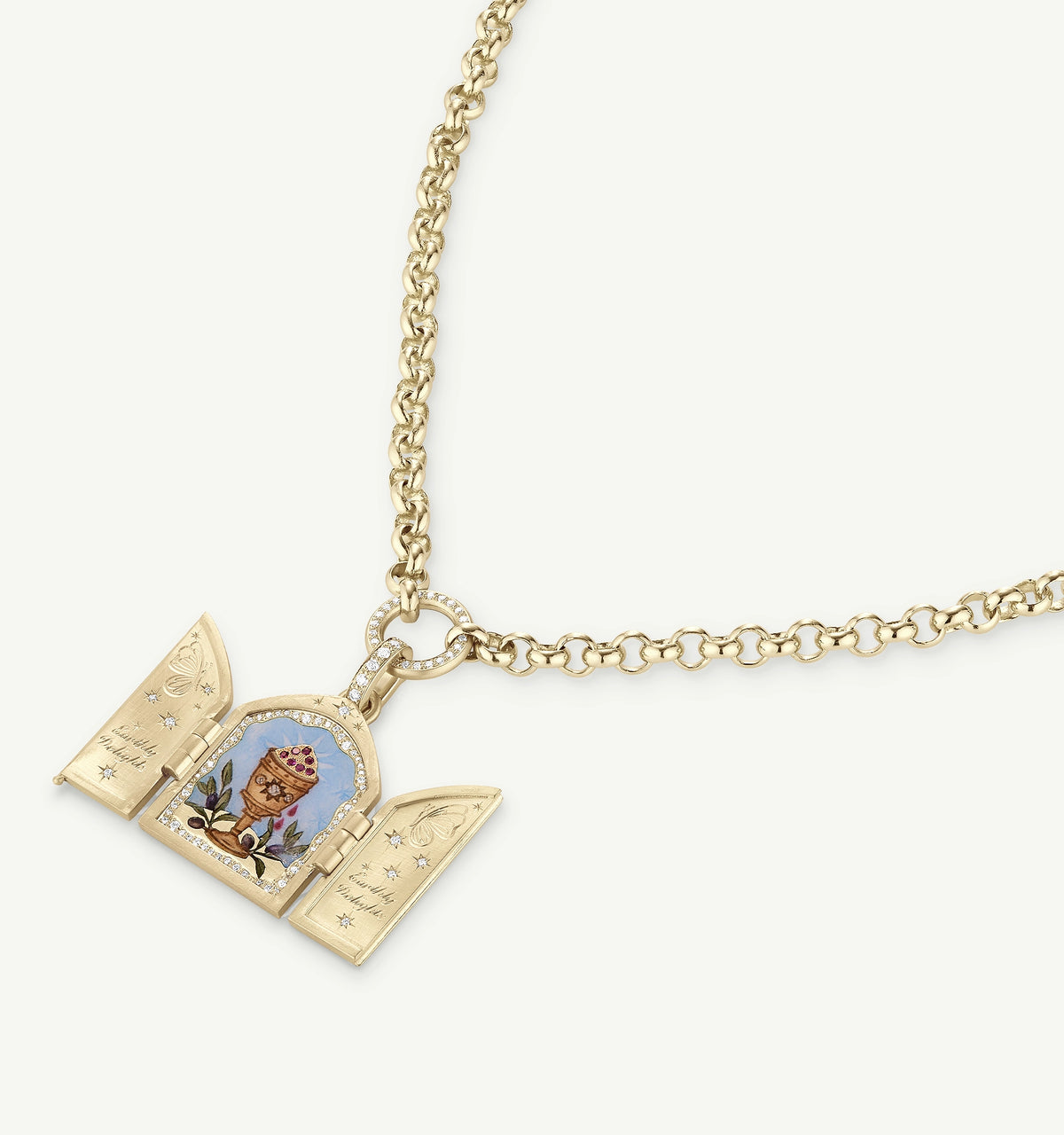 Gold pendant necklace featuring a hinged, engraved locket with a painted design inside and diamond accents.