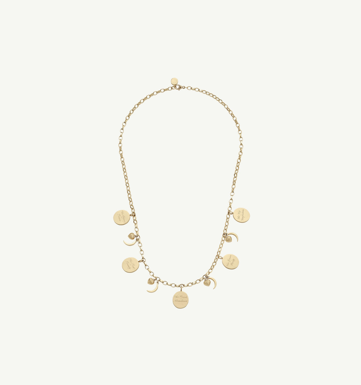 Gold necklace featuring circular pendants with engraved designs and crescent shapes on a delicate chain.