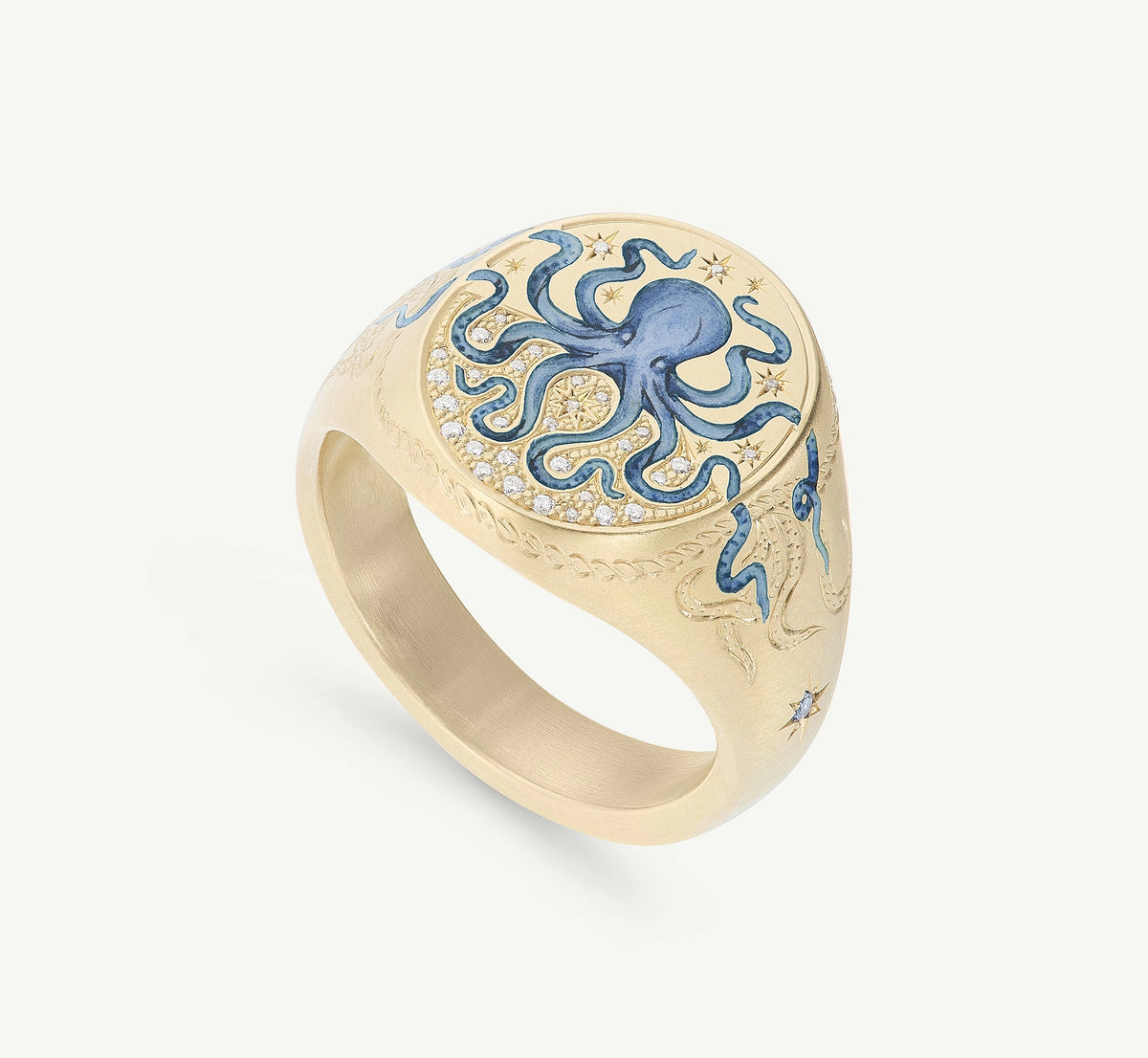 Gold ring featuring an octopus design with blue enamel and diamonds.