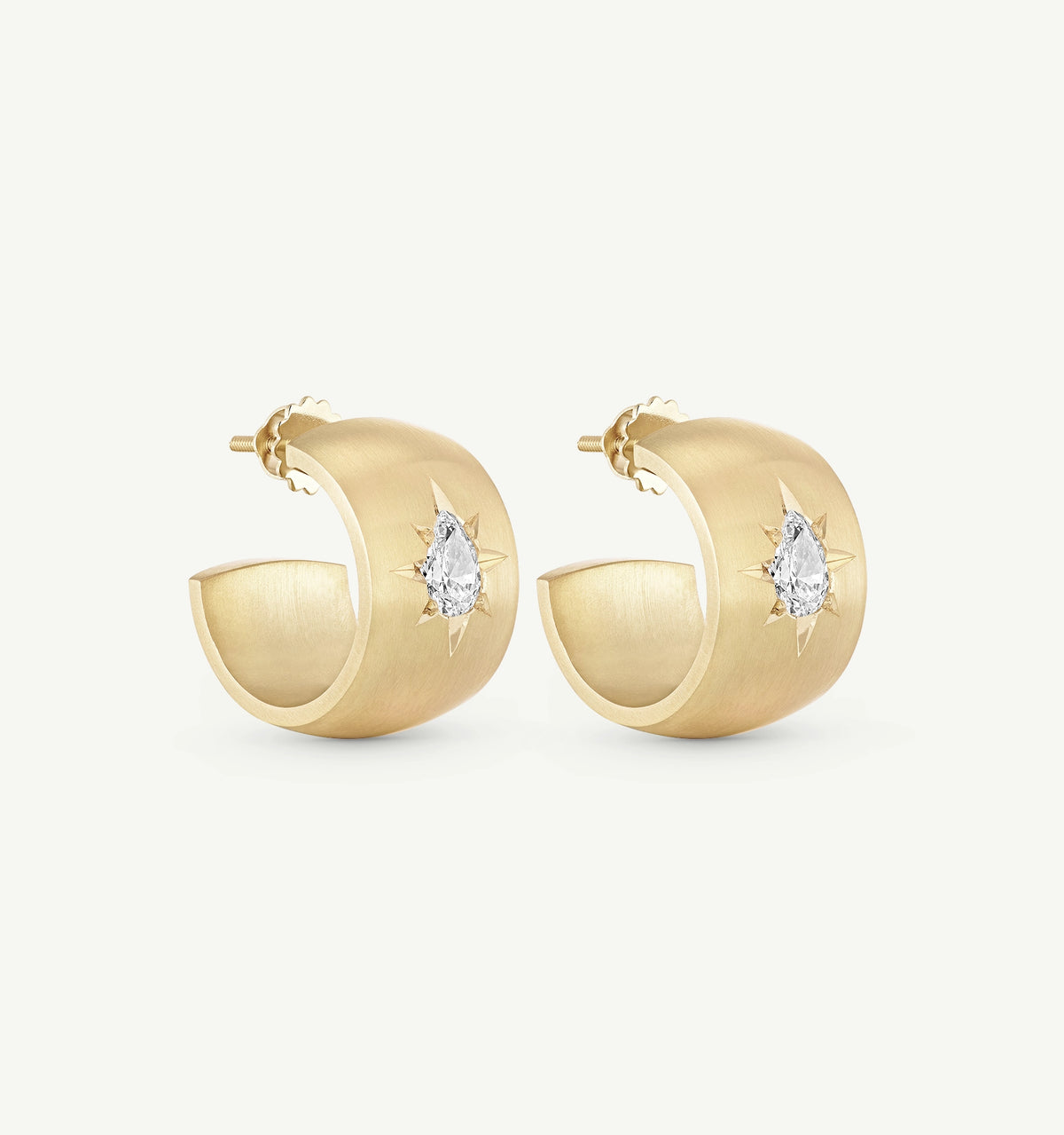 Gold hoop earrings featuring pear-shaped diamonds with star motifs.