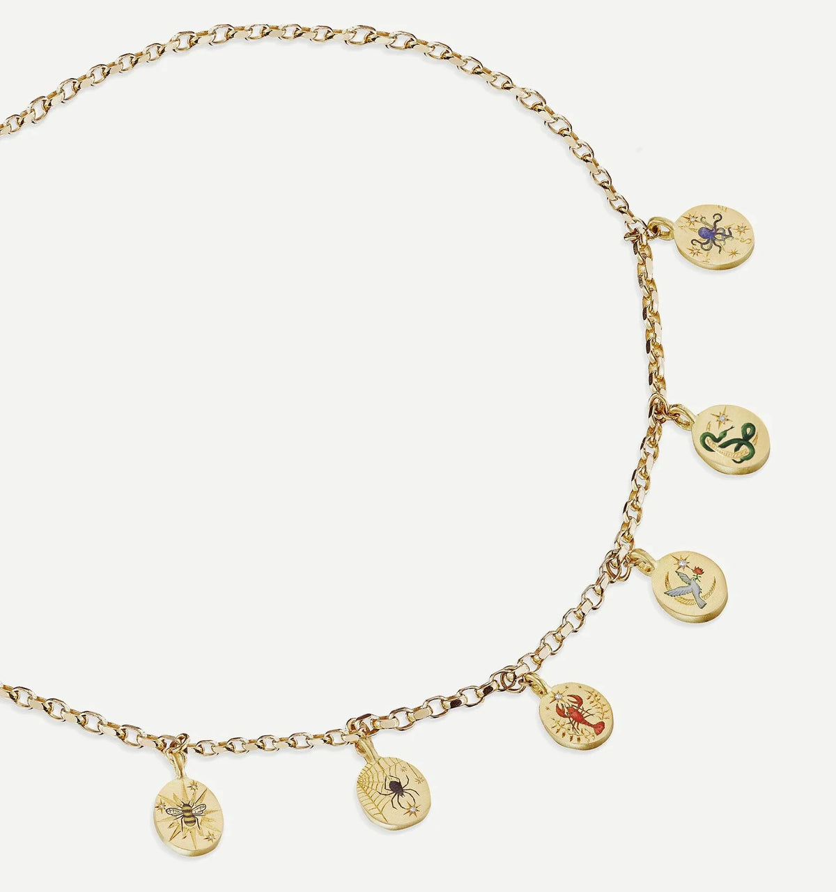 Gold necklace featuring decorative charms with illustrations of a bee, spider, cactus, and stars.