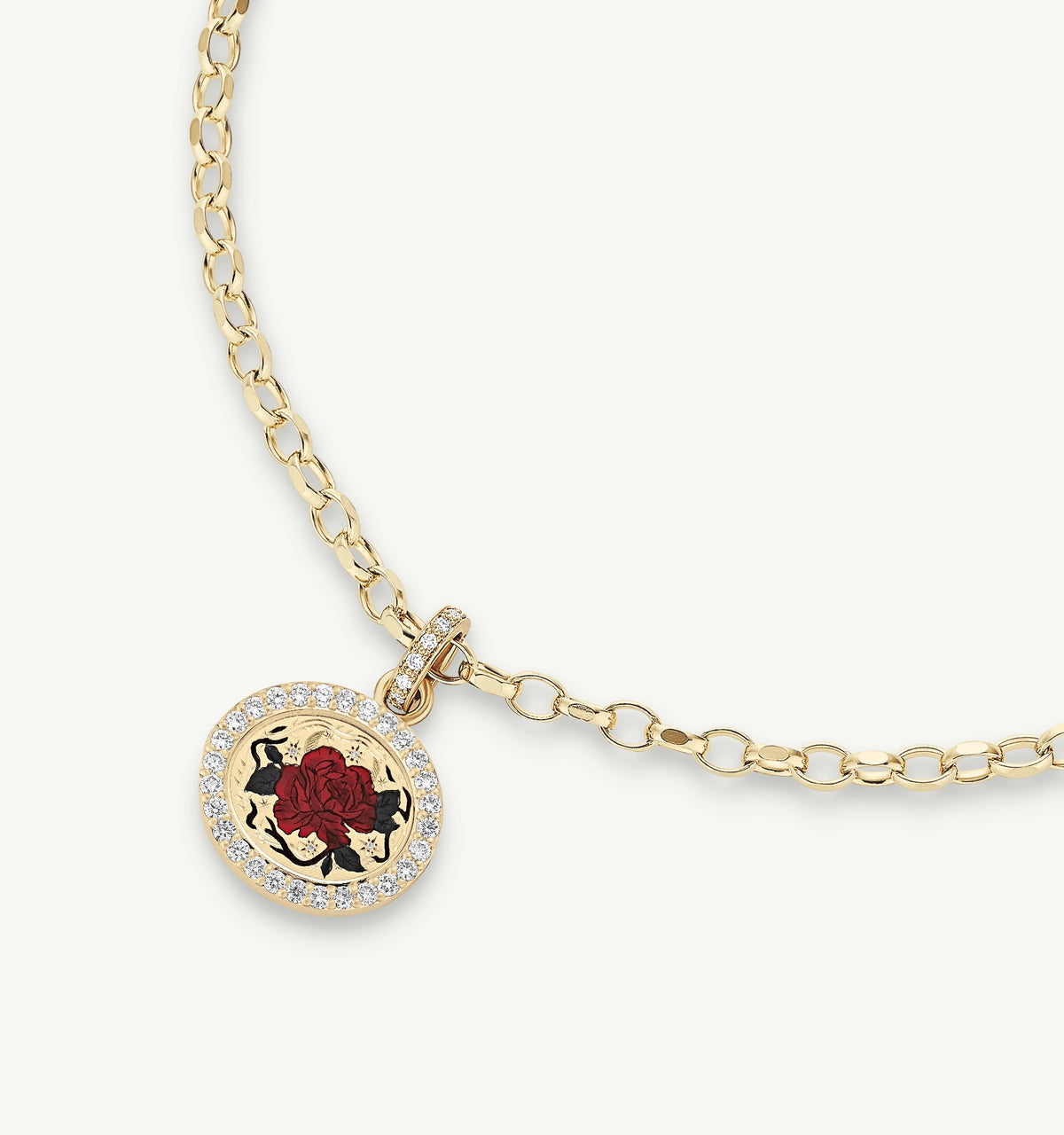 Gold necklace featuring a round pendant with a red rose in enamel and a border of diamonds