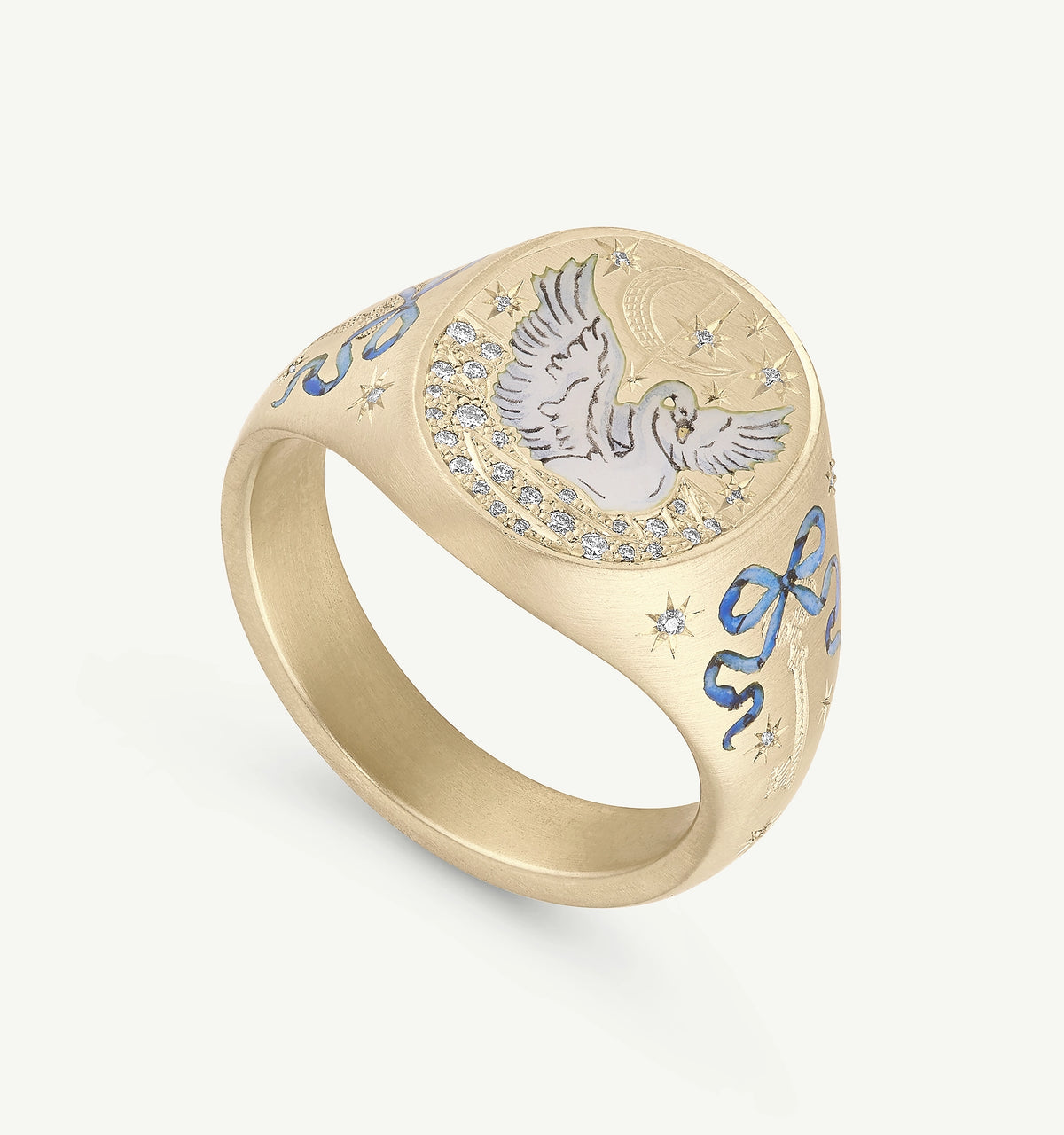 Gold ring featuring a hand-painted dove design and blue enamel bow accents, embellished with diamonds.