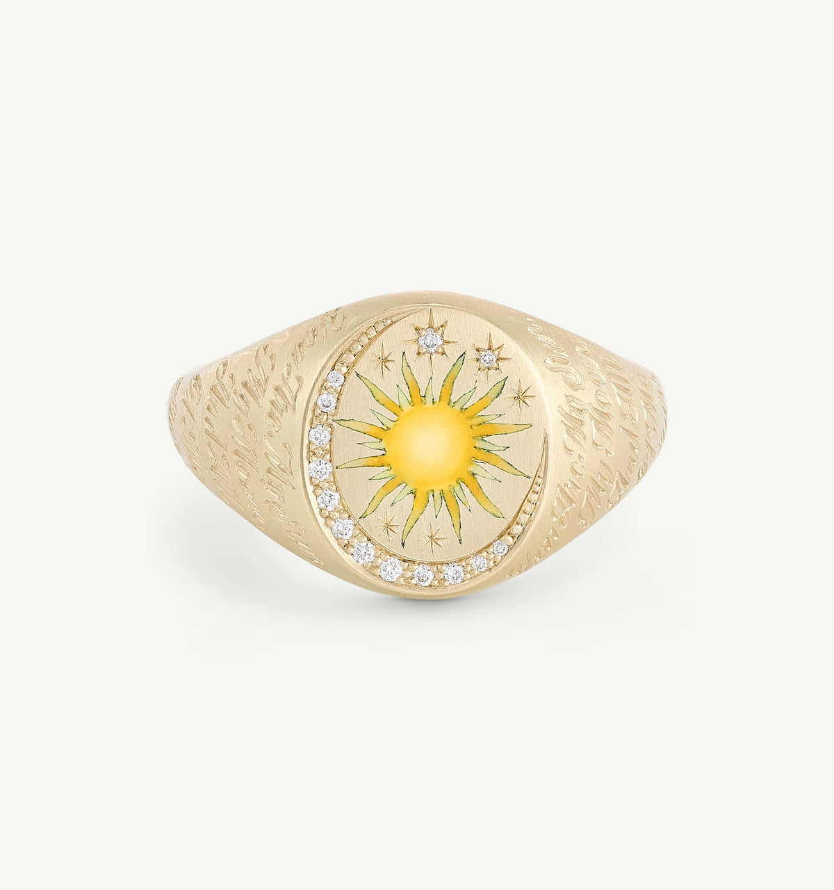 Gold signet ring featuring an engraved sun and crescent moon motif, accented with diamonds and colourful enamel details.