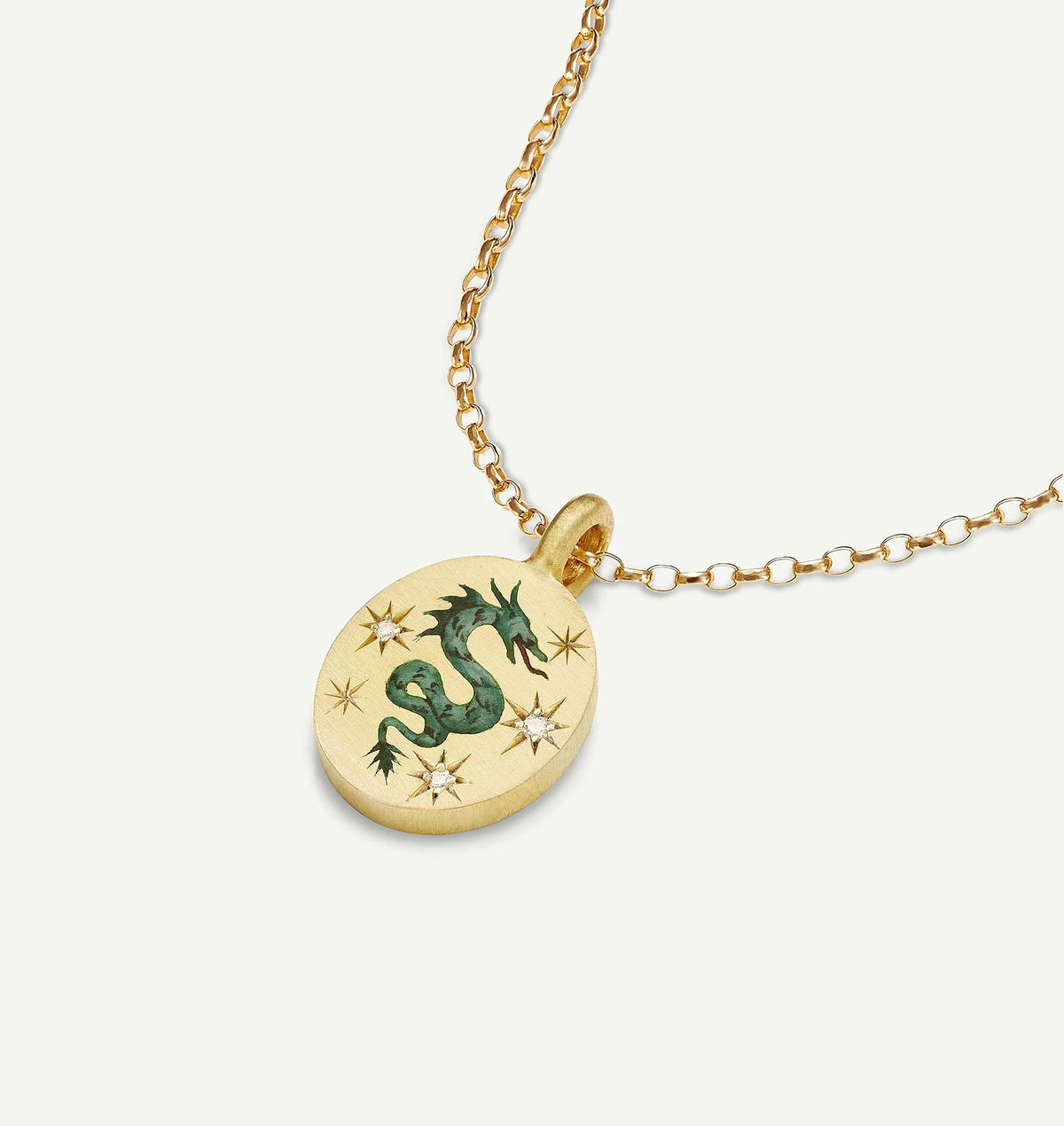 Gold pendant featuring a dragon design in enamel, adorned with five diamond accents on a delicate chain.