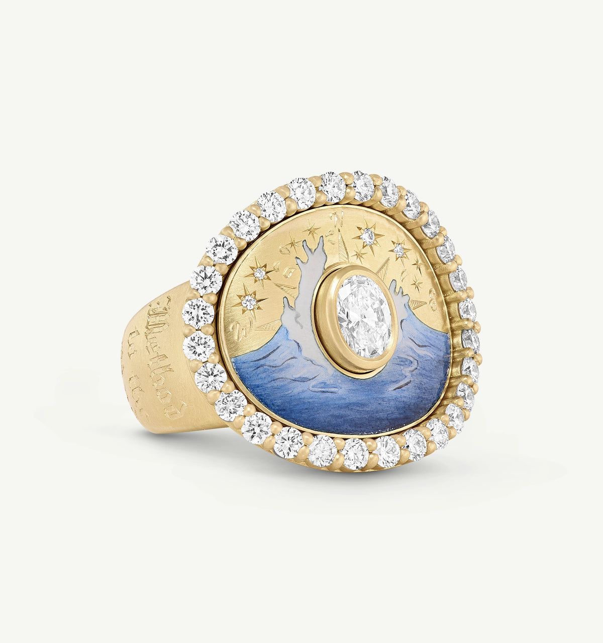 Gold ring featuring a central oval diamond surrounded by a blue painted wave motif and accent diamonds.