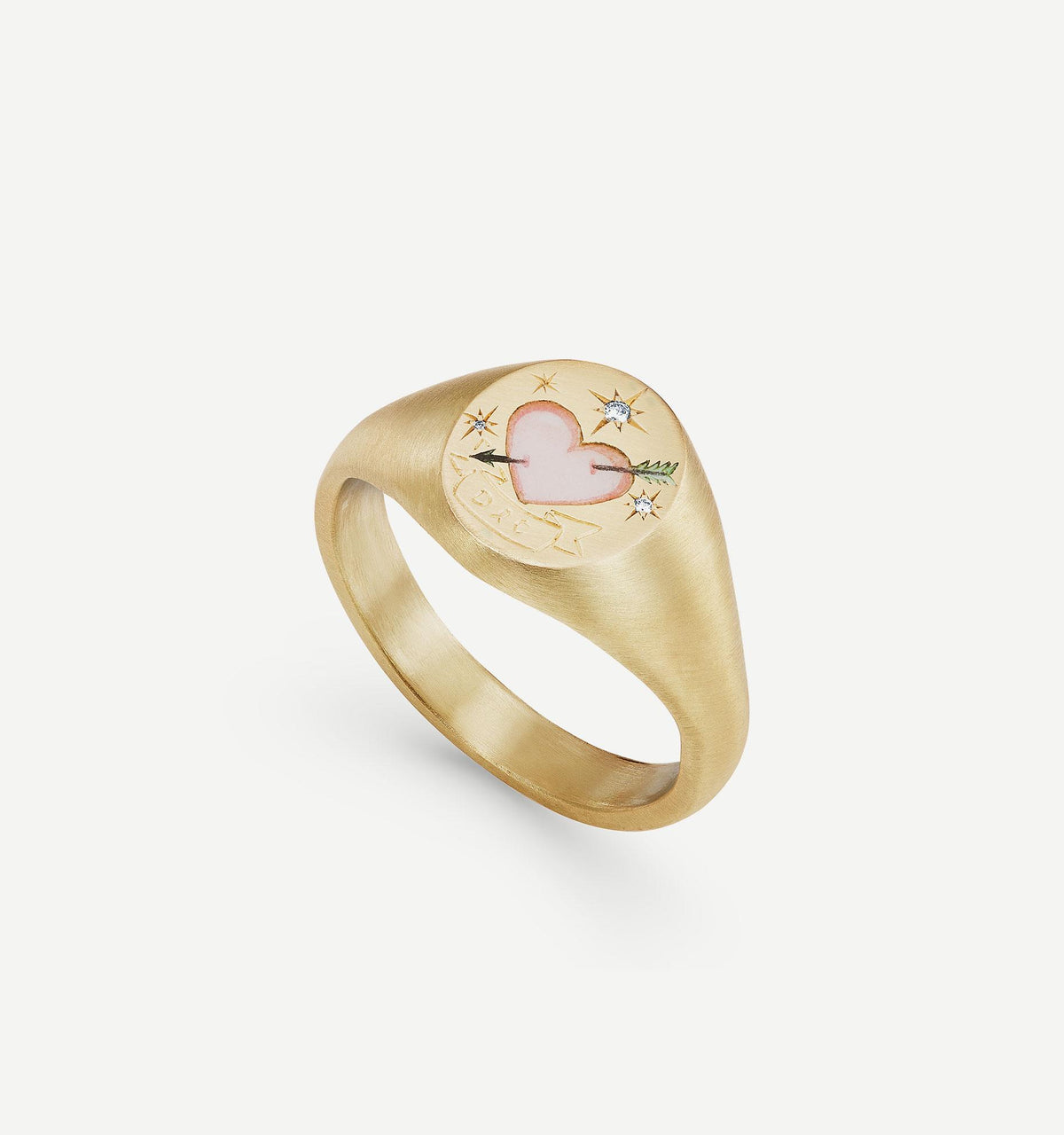 Gold signet ring featuring a pink heart motif with engraving and accent diamonds.