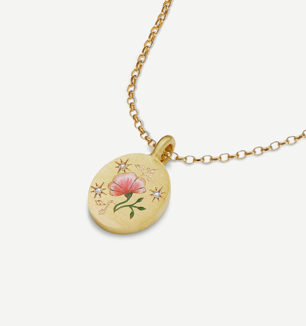 Gold pendant featuring a pink flower in enamel and stars, suspended on a delicate gold chain.