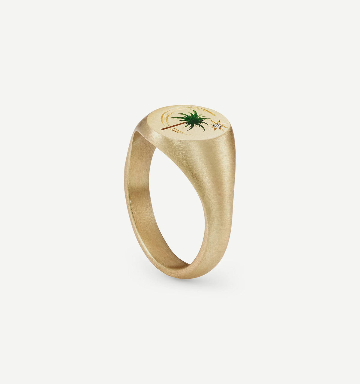 Gold ring featuring an engraved palm tree design and a small diamond accent.