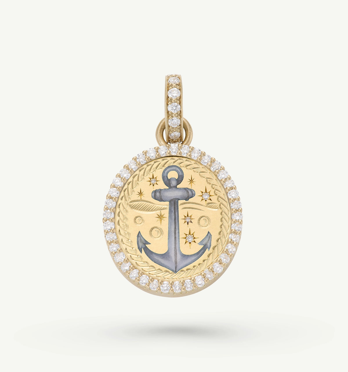 Gold charm pendant featuring an anchor design with white enamel and accents of diamonds.