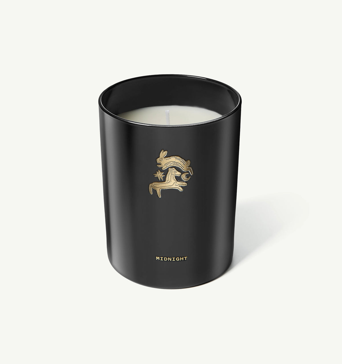 Gold candle holder featuring a rabbit and horse design against a black background.