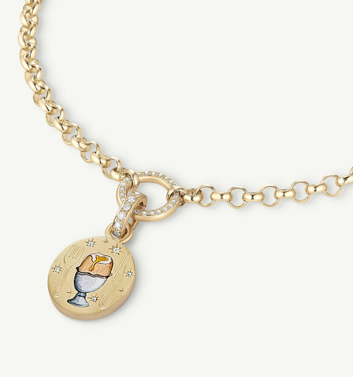 Gold necklace featuring a pendant with an ice cream motif in enamel and accents of diamond.
