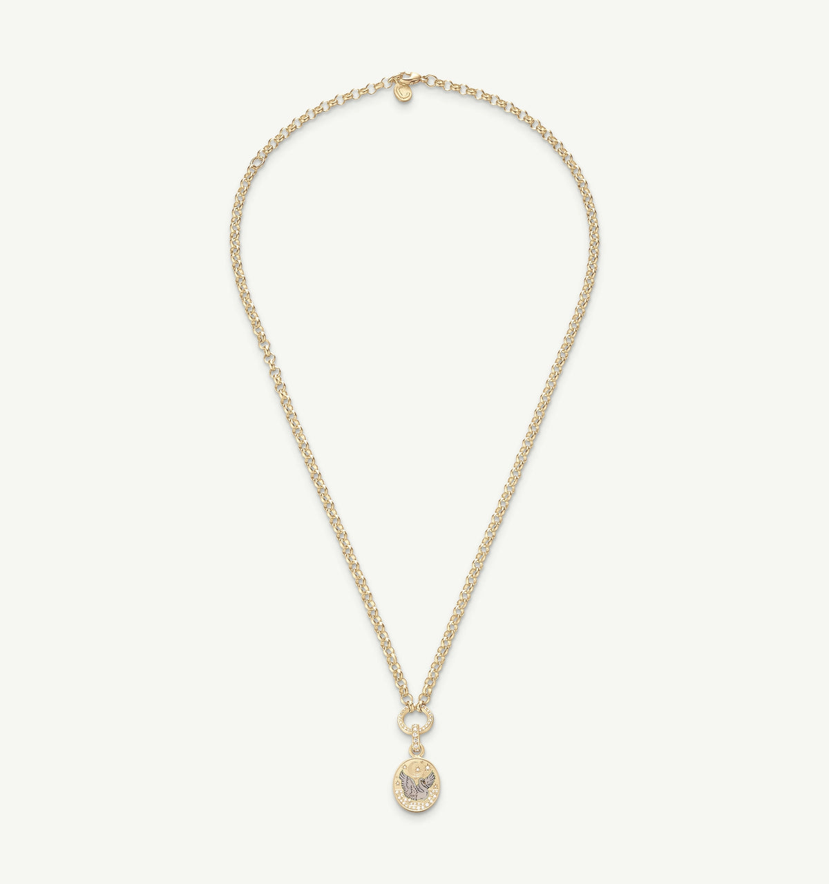 Gold chain necklace featuring an oval pendant with an engraved design.