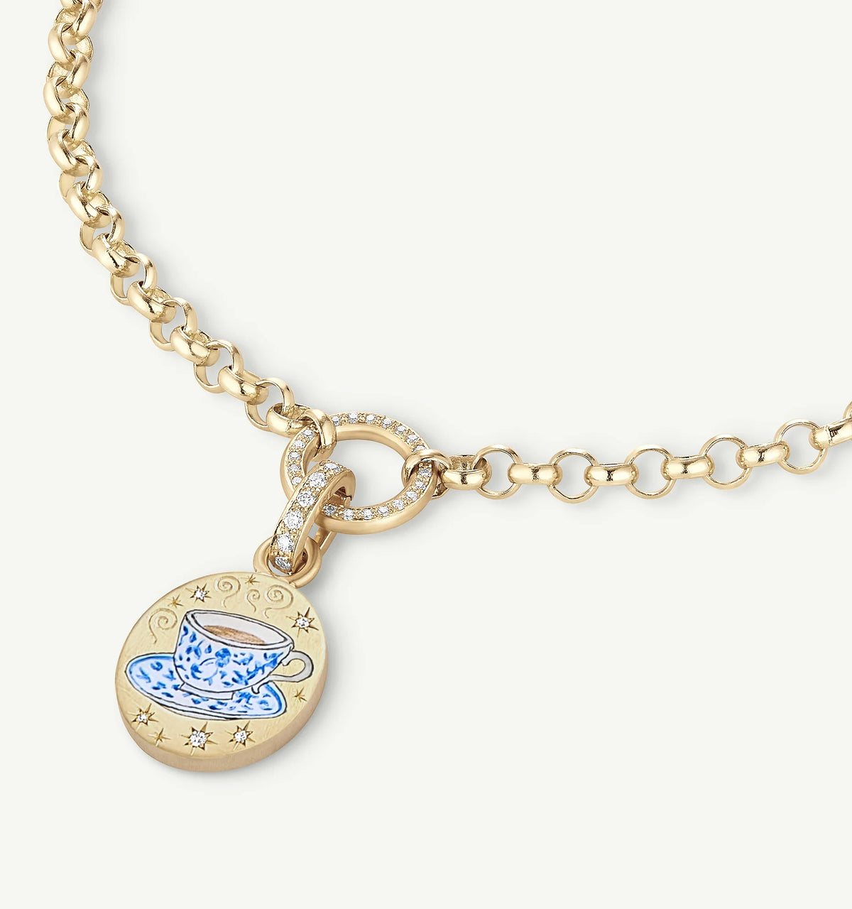 Gold chain necklace featuring a pendant with a blue teacup design and diamond accents.
