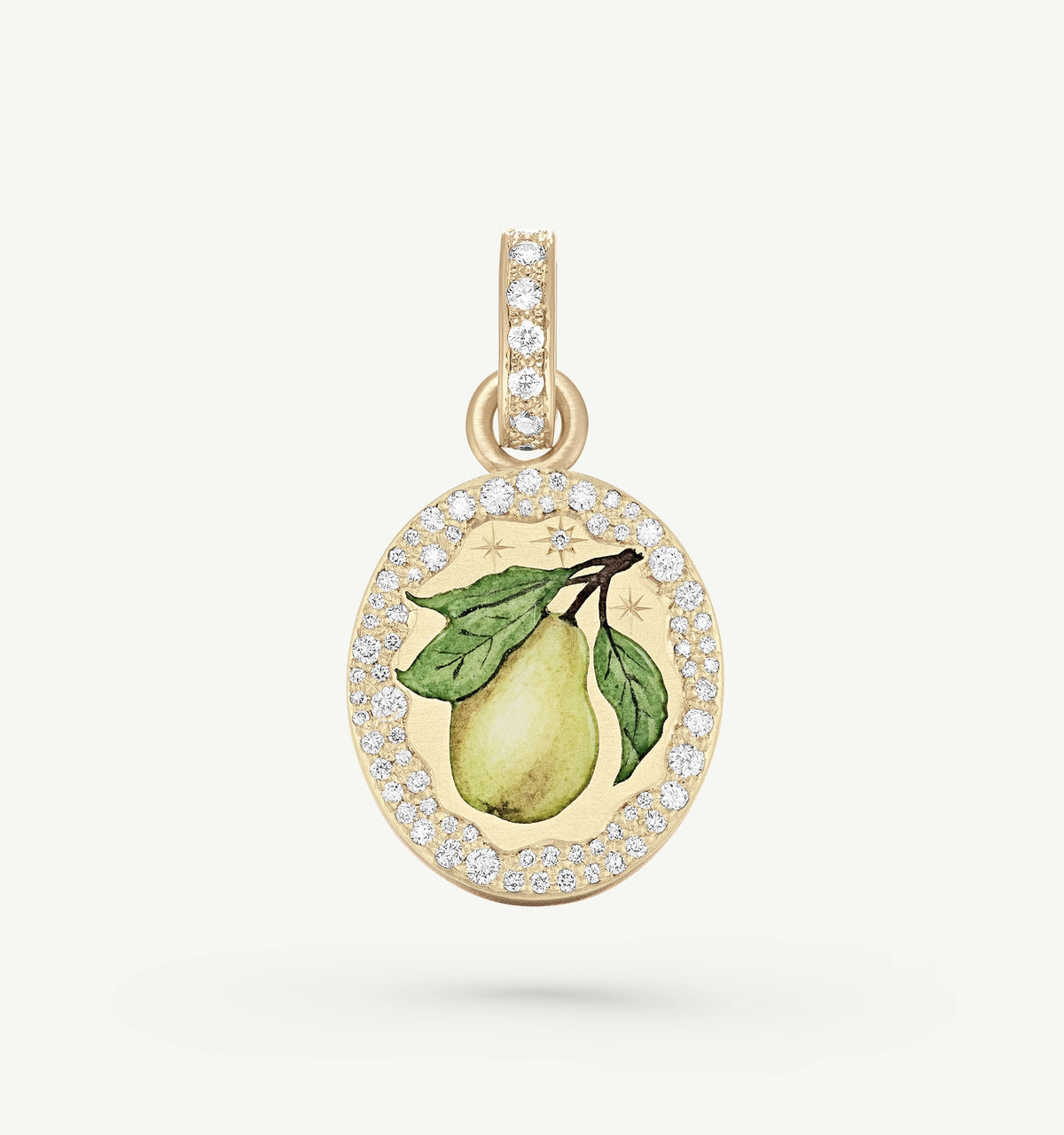 Gold pendant featuring a pear with green leaves in enamel and a halo of diamonds.