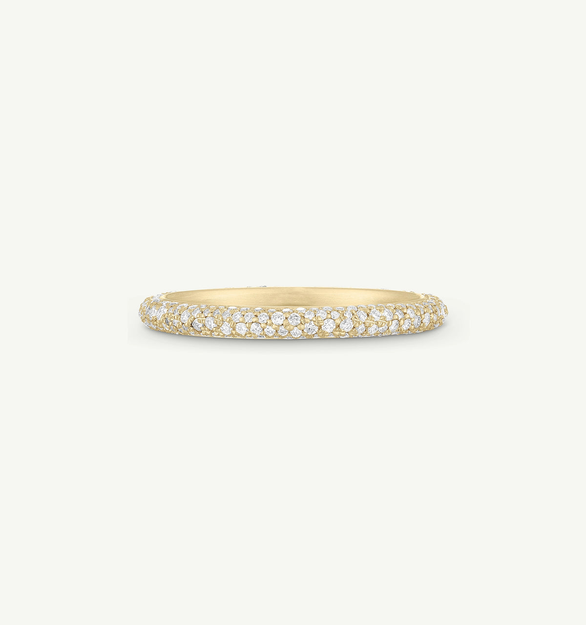 Gold ring featuring a row of diamonds set in a delicate band.
