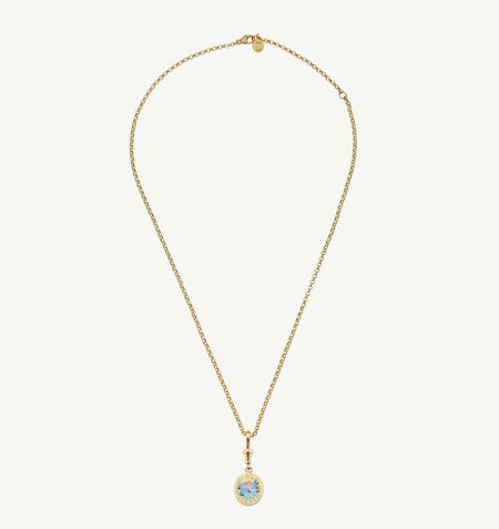 Gold necklace featuring an oval pendant with blue and green enamel detailing.