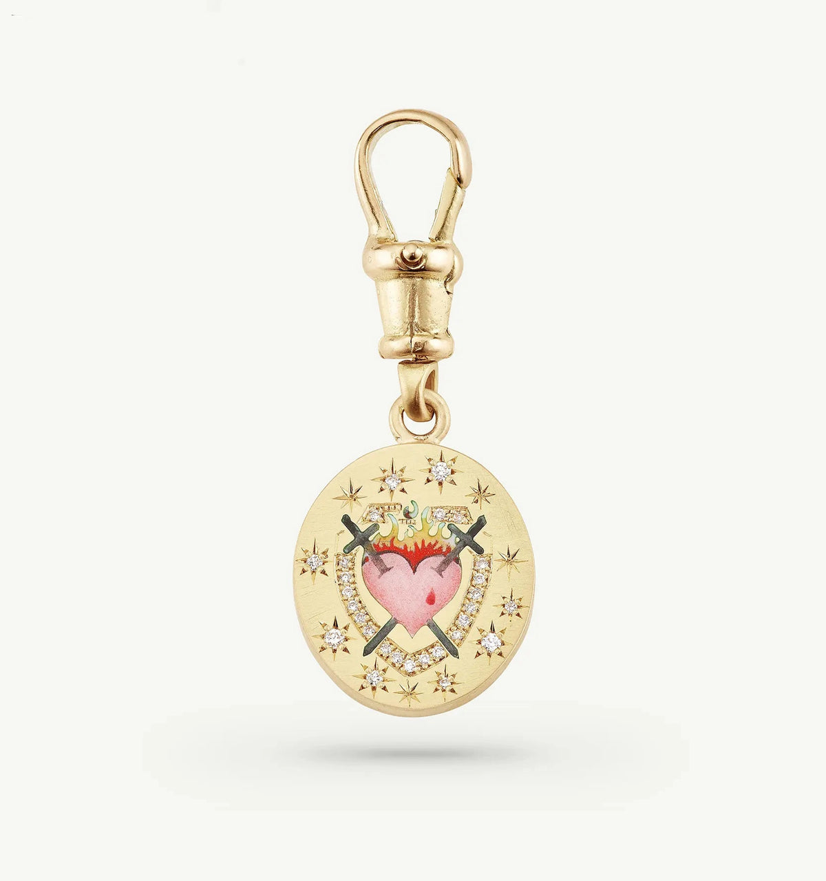 Gold charm featuring a heart design, crossed swords, and small diamonds set in a star pattern.