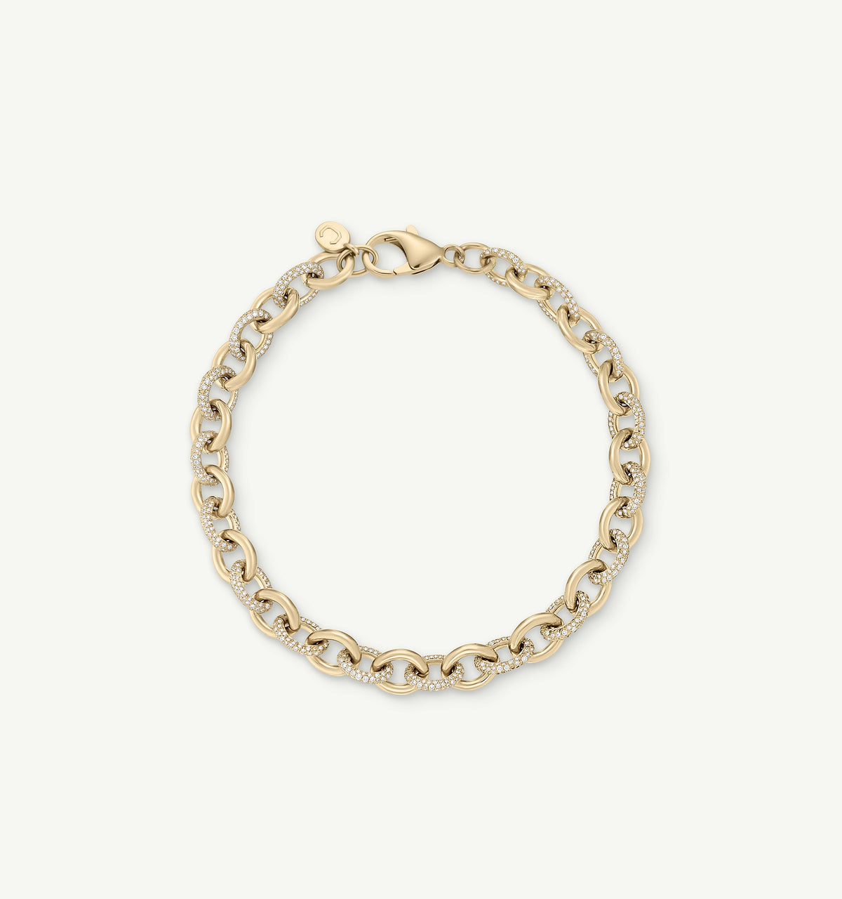 Gold chain bracelet with links alternating in a polished finish and diamond accents.