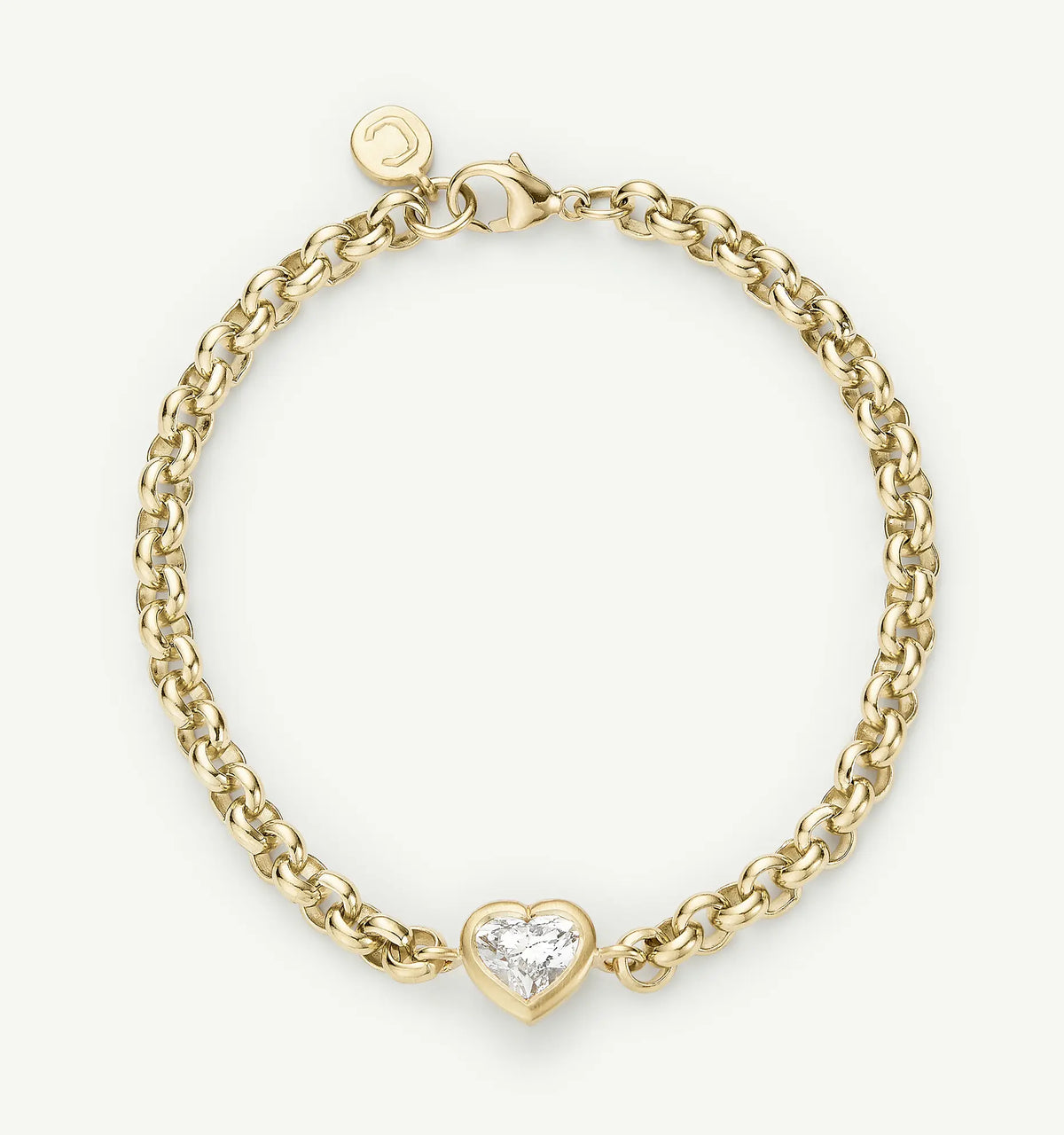 Gold chain bracelet featuring a heart-shaped diamond centrepiece.