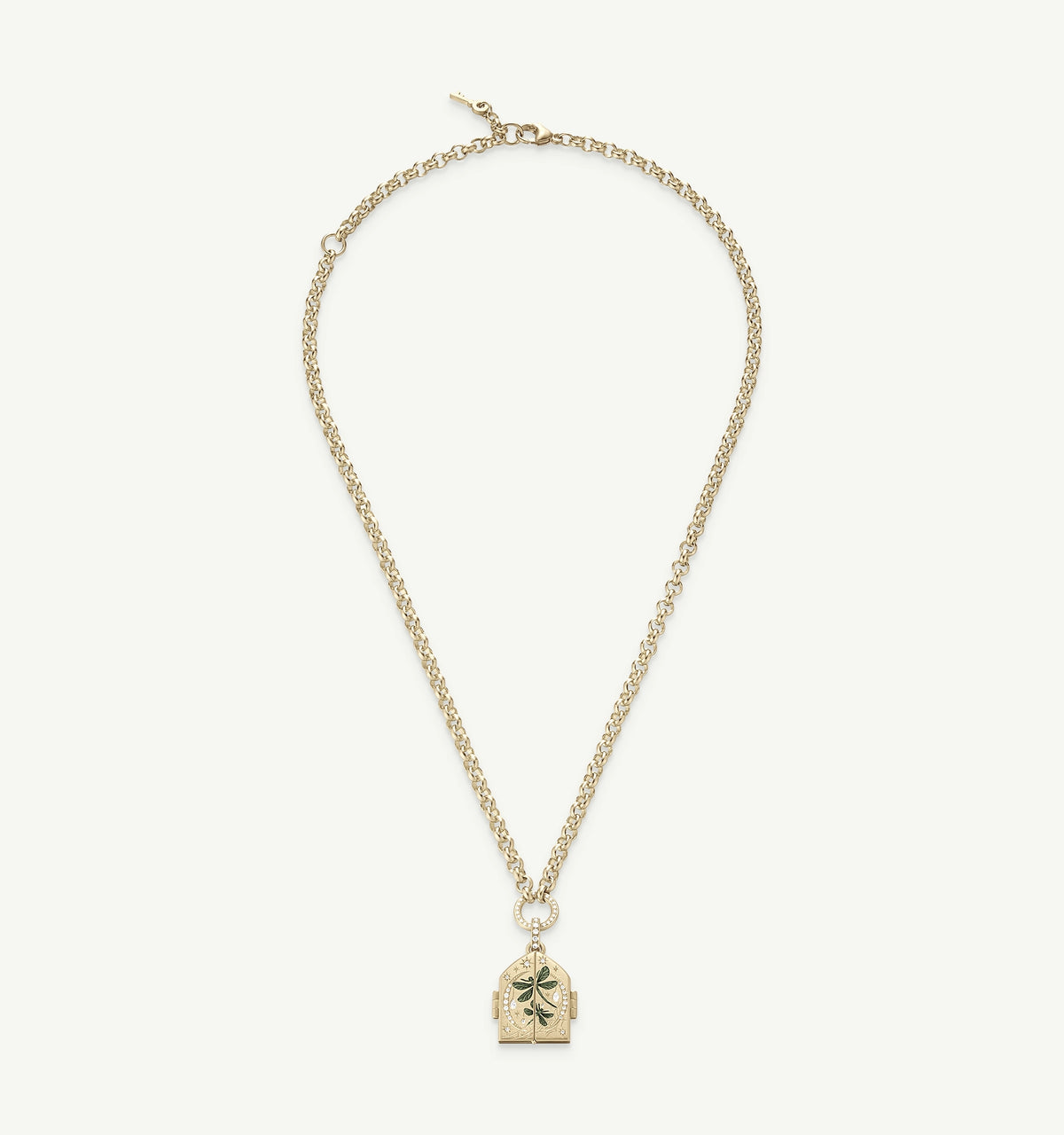 Gold necklace with a locket pendant featuring an engraved leaf motif.