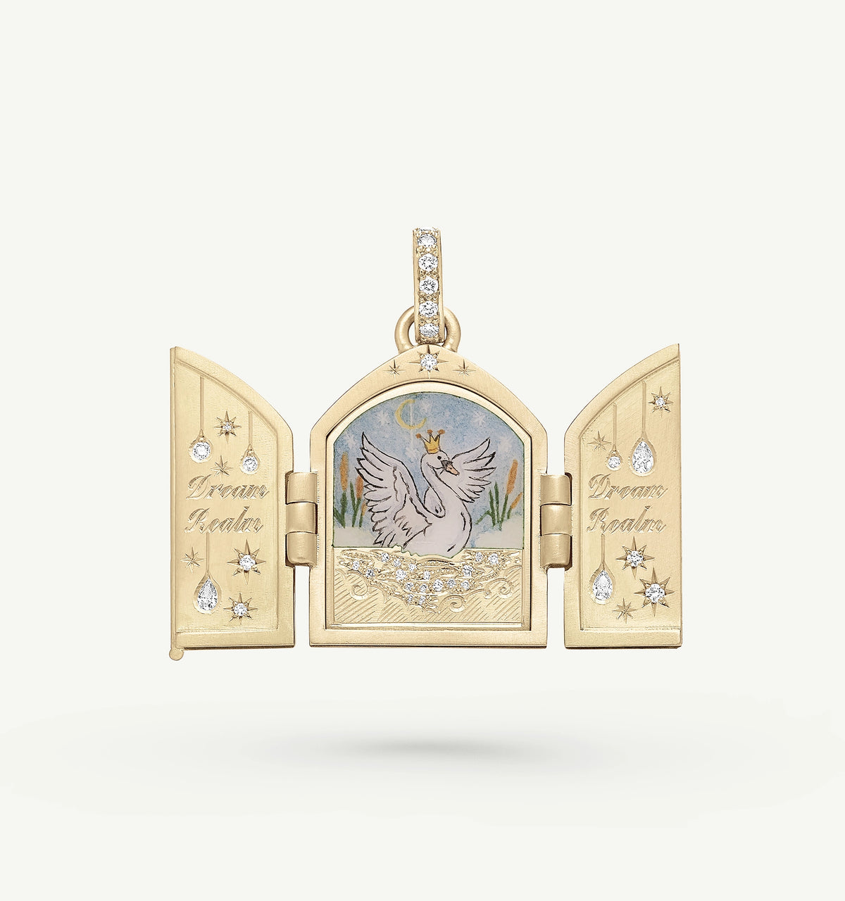 Gold locket with a swan illustration, featuring enamel details and diamonds, inscribed with "Dream Keeper."