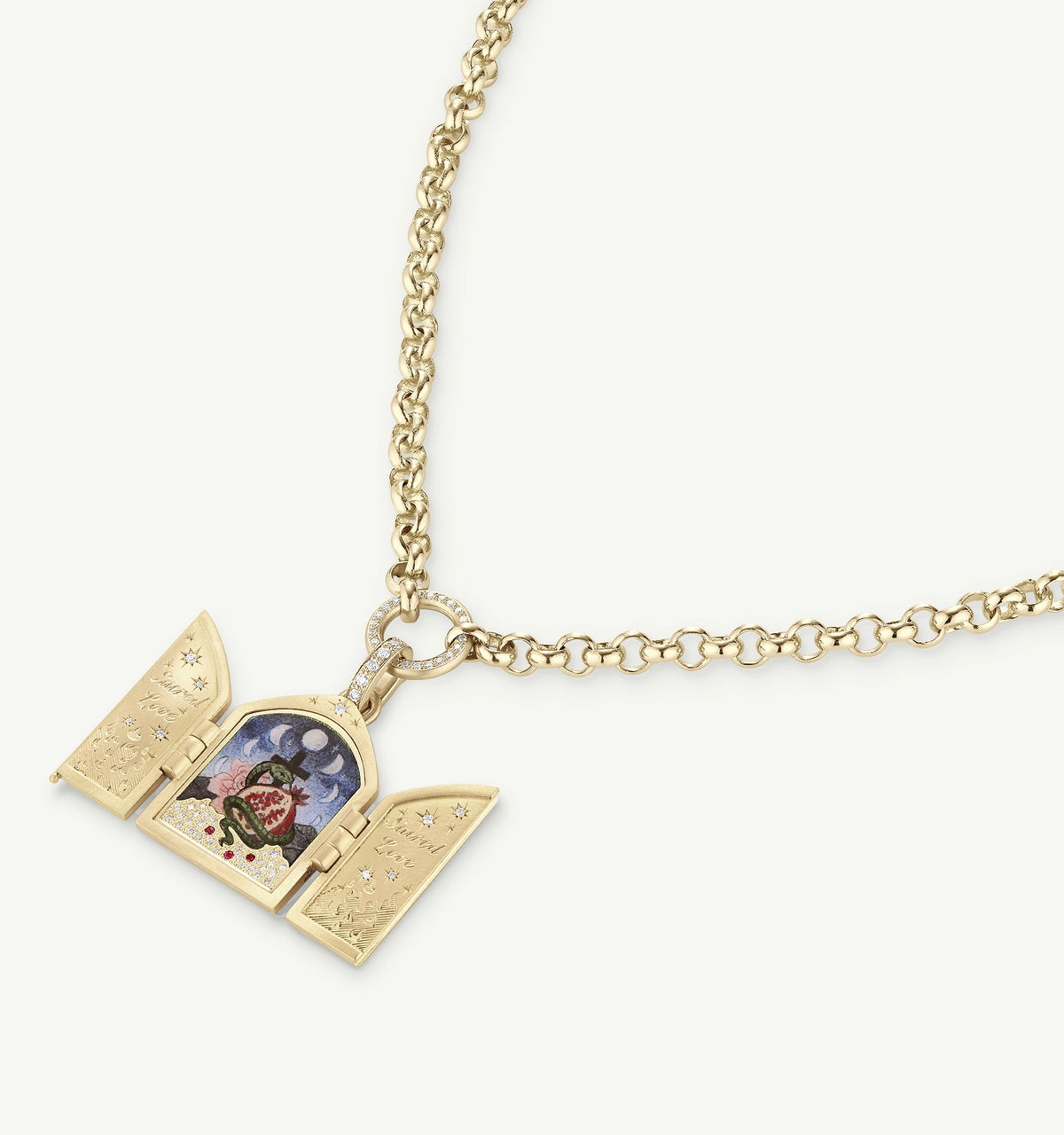 Gold pendant necklace featuring a decorative locket with a painted interior and diamond accents on the opening.