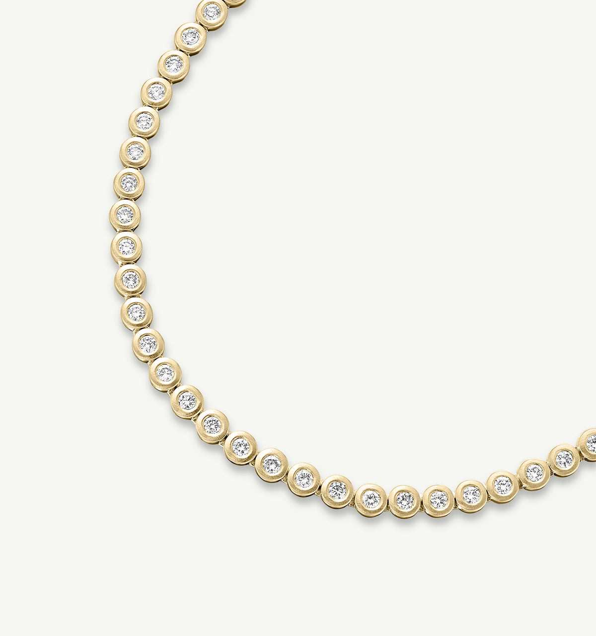 Gold necklace featuring round settings with alternating diamonds.