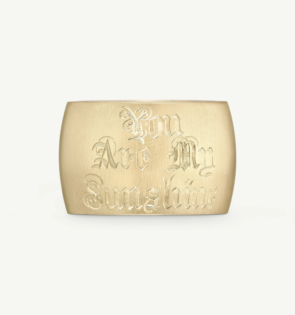 Gold ring featuring engraved text "You Are My Sunshine" in decorative font.