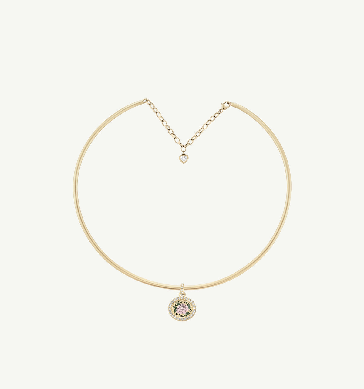Gold choker necklace with an enamel floral pendant and a small heart charm.