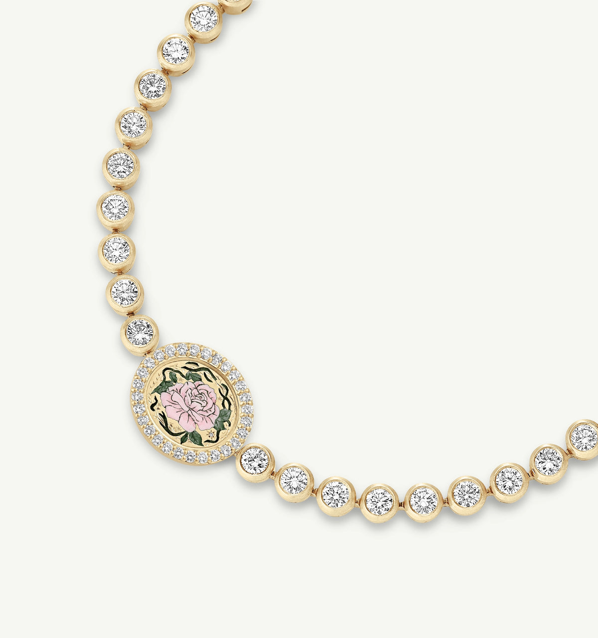 Gold necklace featuring a floral enamel pendant surrounded by diamonds.