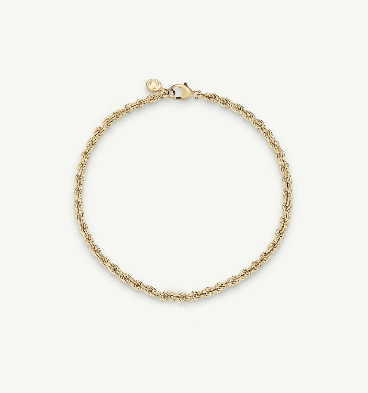 Gold twisted chain bracelet with a secure lobster clasp against a neutral background.