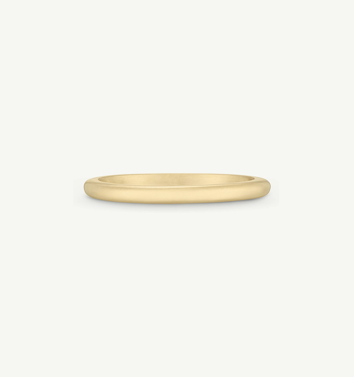Gold band ring with a smooth, polished finish on a light background.