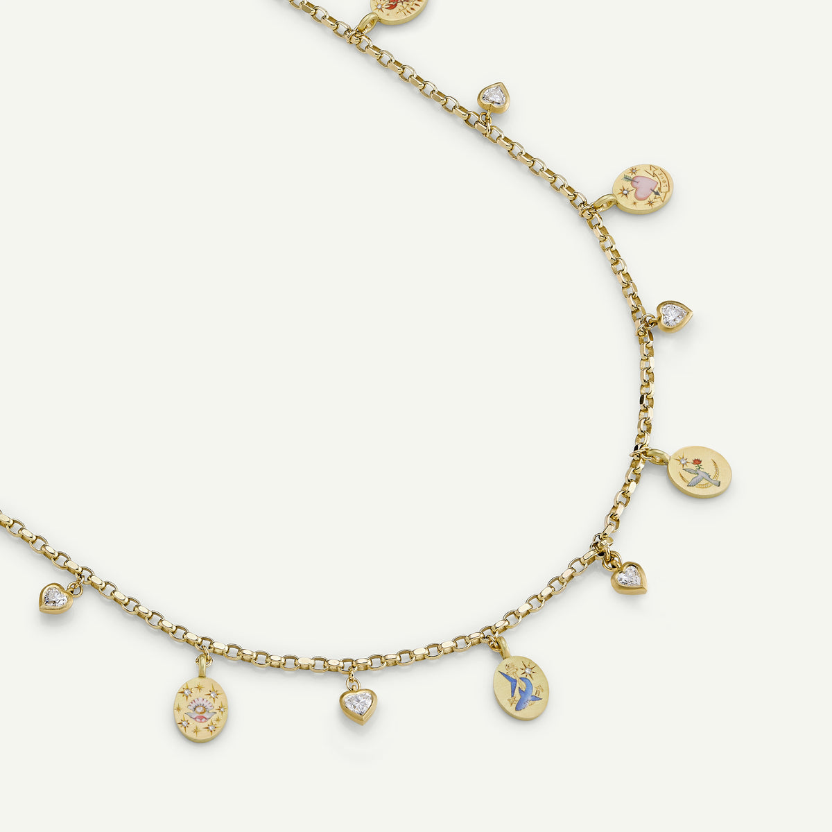 Gold necklace featuring colourful enamel charms and heart-shaped accents.