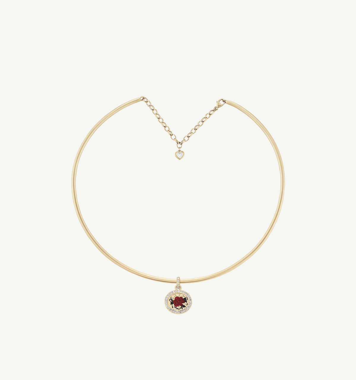 Gold choker necklace featuring a red enamel motif with a circular charm and a delicate heart accent.