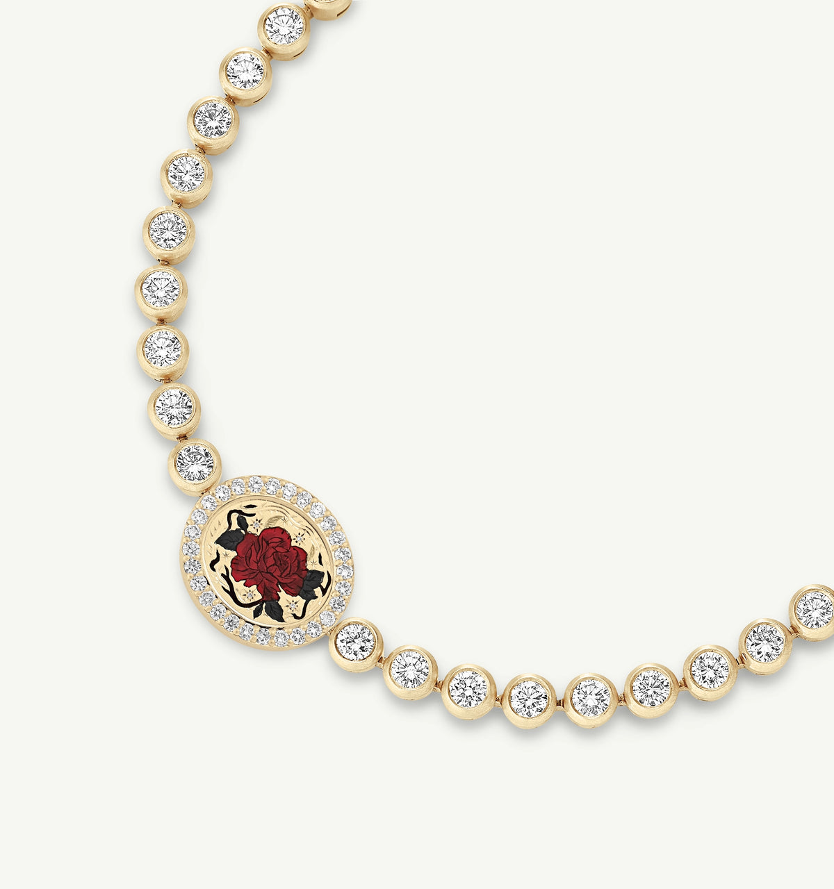 Gold necklace featuring a central enamel motif of red roses, surrounded by round diamonds.
