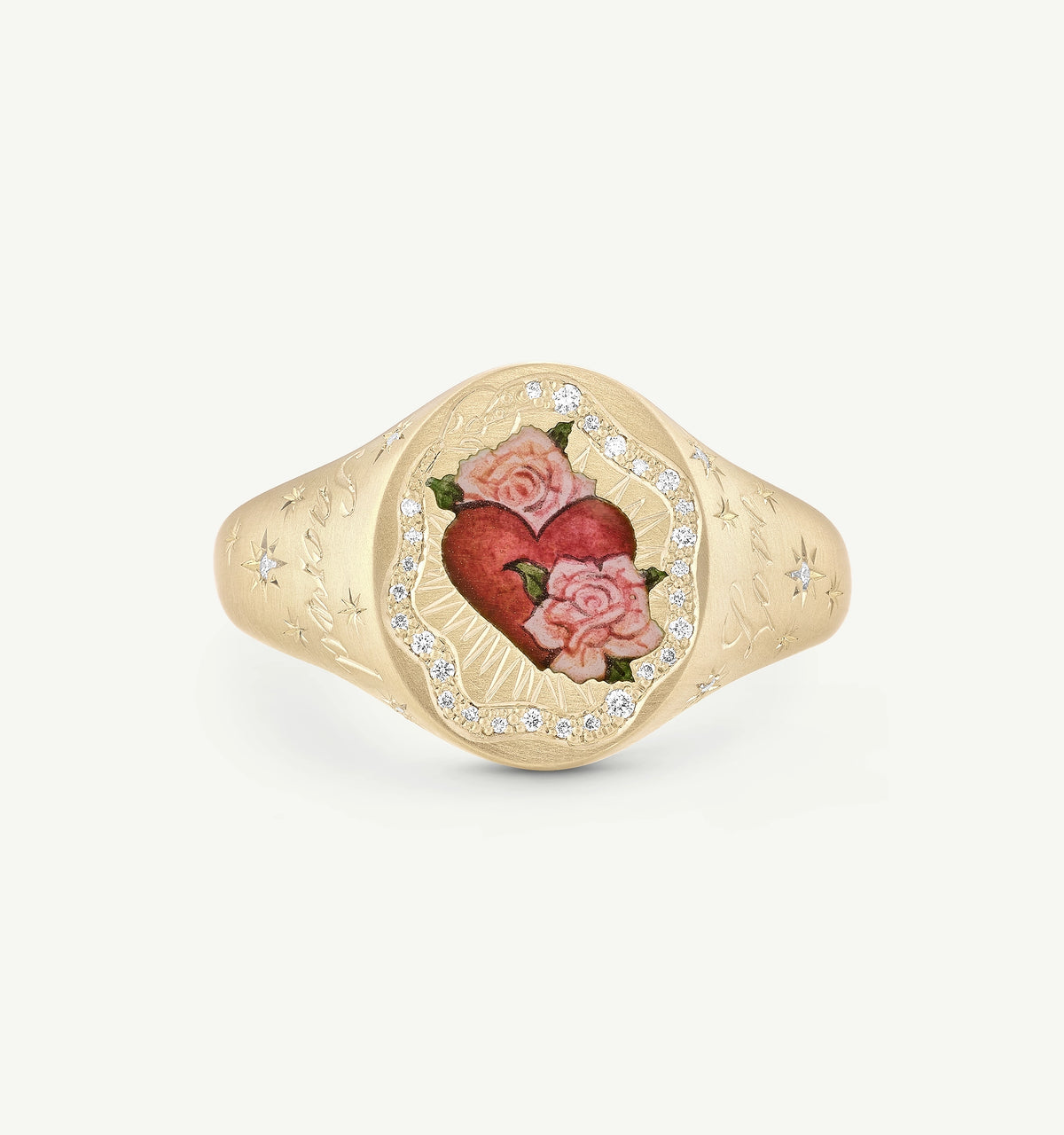 Gold ring featuring a hand-painted heart and roses motif, adorned with small diamonds along the edge.