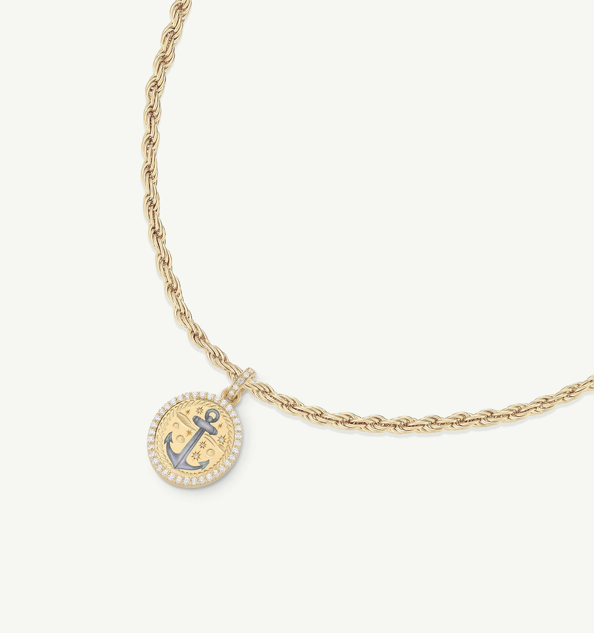 Gold necklace featuring a round pendant with an anchor design and diamond accents.