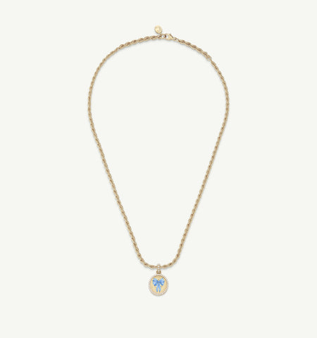 Gold necklace with a blue butterfly pendant, featuring a twisted chain design.